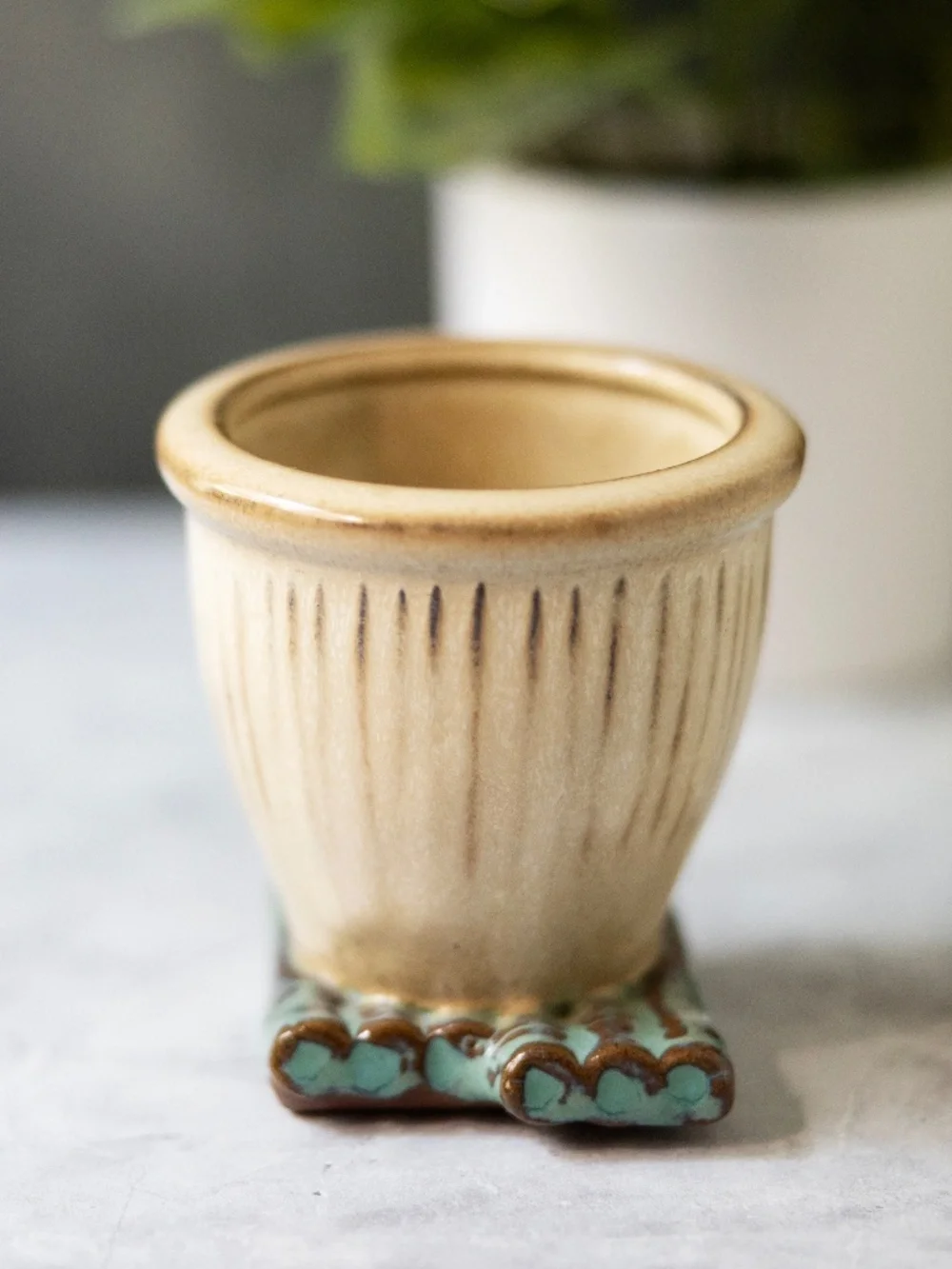 Asian ceramic planter with faux bamboo base 3.5
